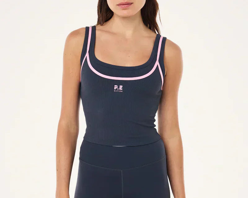 PE NATION TANK TOP ON STUDIO MODEL