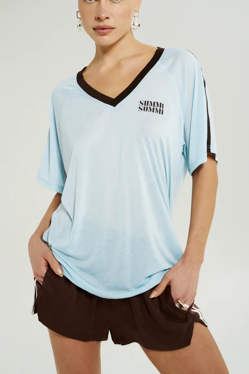 Model wearing summi shirt front view
