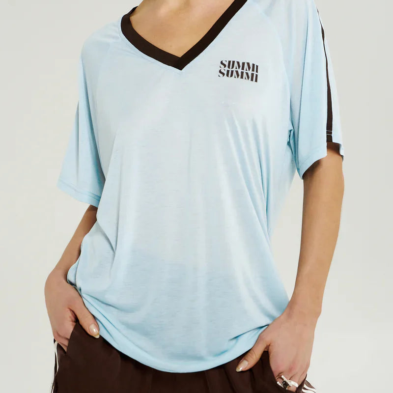 Model wearing summi shirt front view