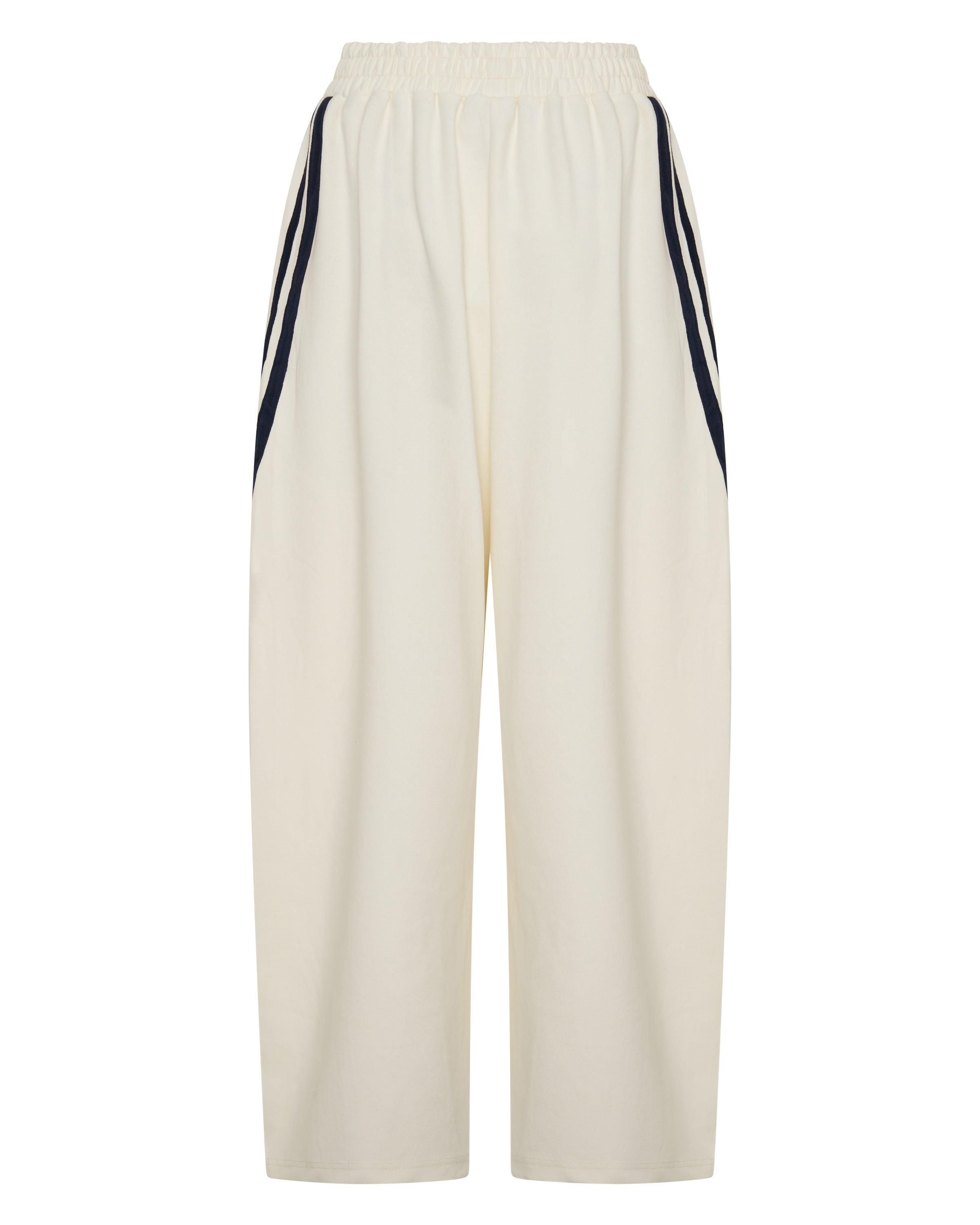 BACK ŚSAINT Barrel Trackpant in butter with navy double side stripe detail