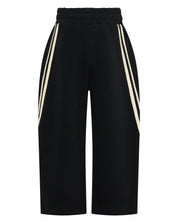 ŚSAINT Kids Barrel Trackpant in black with butter double stripe detail ack image