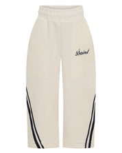 ŚSAINT Kids Barrel Trackpant in butter with navy double stripe detail