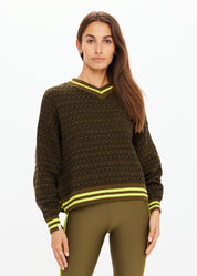 Model wearing The Upside Castilla Clementine Knit Crew olive TU monogram knit sweater relaxed fit