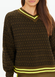 Close up TU monogram knit jacquard detail The Upside olive designer sweater