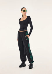 PE Nation Clarity Trackpant in black, side profile, regular fit