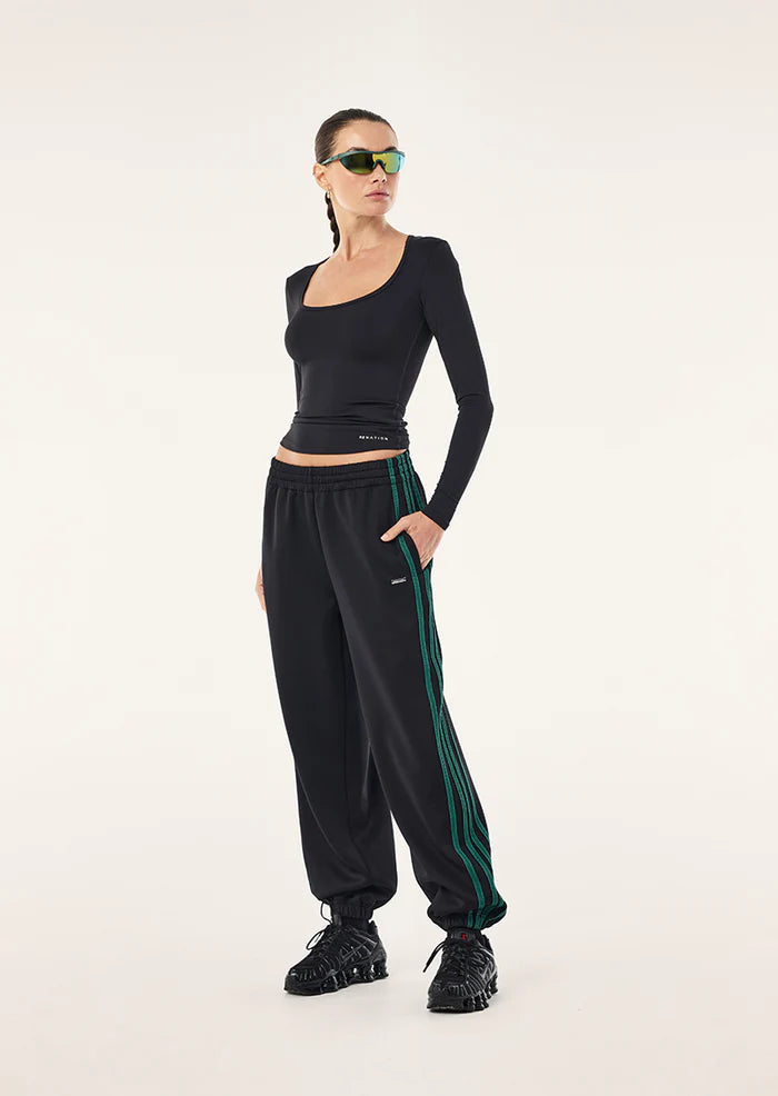 PE Nation Clarity Trackpant in black, side profile, regular fit