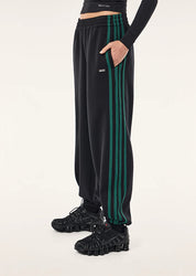 PE Nation Clarity Trackpant in black, side profile, regular fit