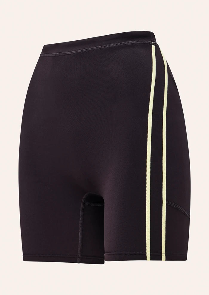 flatlay front view PE Nation Cypher Bike Short in Black Bean & Soft Yellow — high-rise squat-proof activewear short, Wild West Sisters