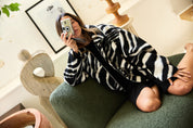 MODEL WITH CAMERA WEARING Bailey Bomber Jacket Zebra Jasmine Alexa