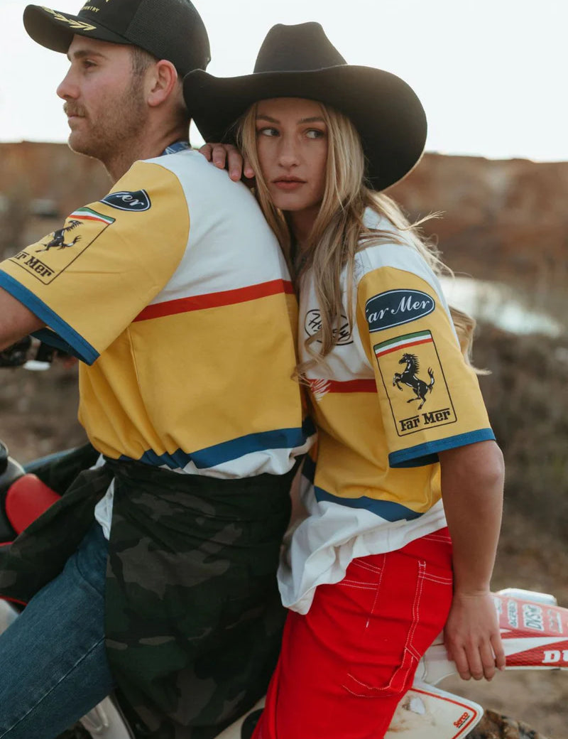 Farmermotorcrewgirlandboyonmotorbike.webp
