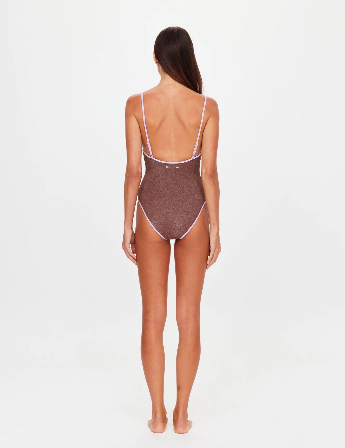 back view with model The Upside Galaxia Flow one piece swimsuit in chocolate metallic – Wild West Sisters