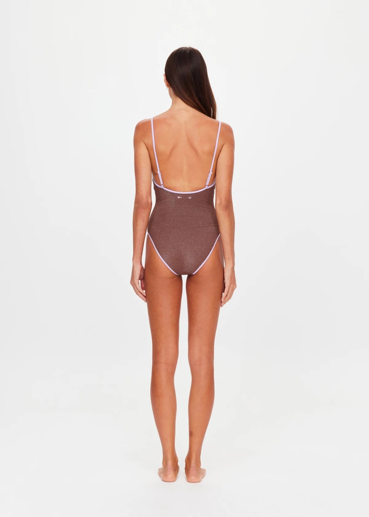 back view with model The Upside Galaxia Flow one piece swimsuit in chocolate metallic – Wild West Sisters