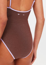 detail shot of The Upside Galaxia Flow one piece swimsuit in chocolate metallic – Wild West Sisters
