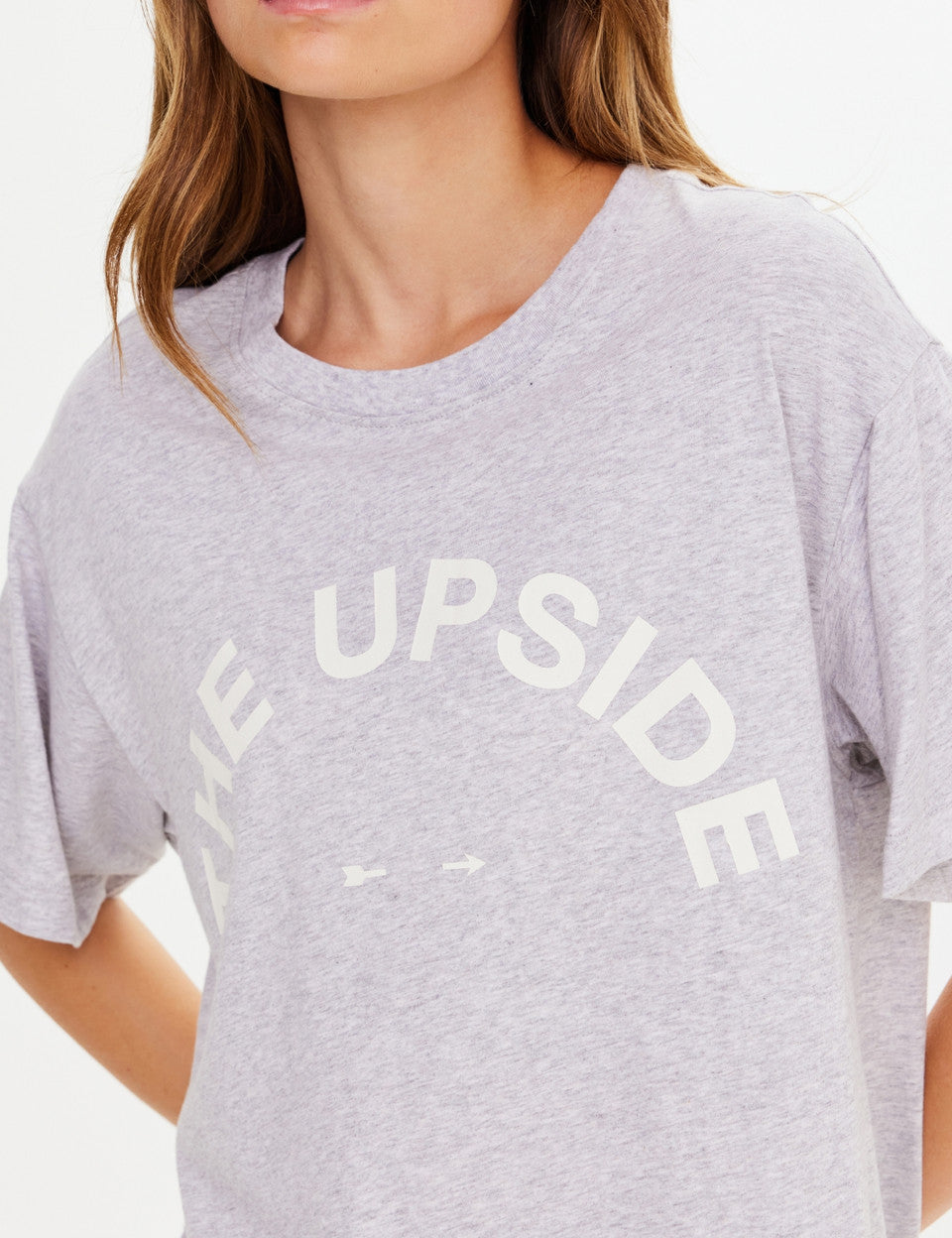 Gray t-shirt with 'The Upside' logo worn by a person