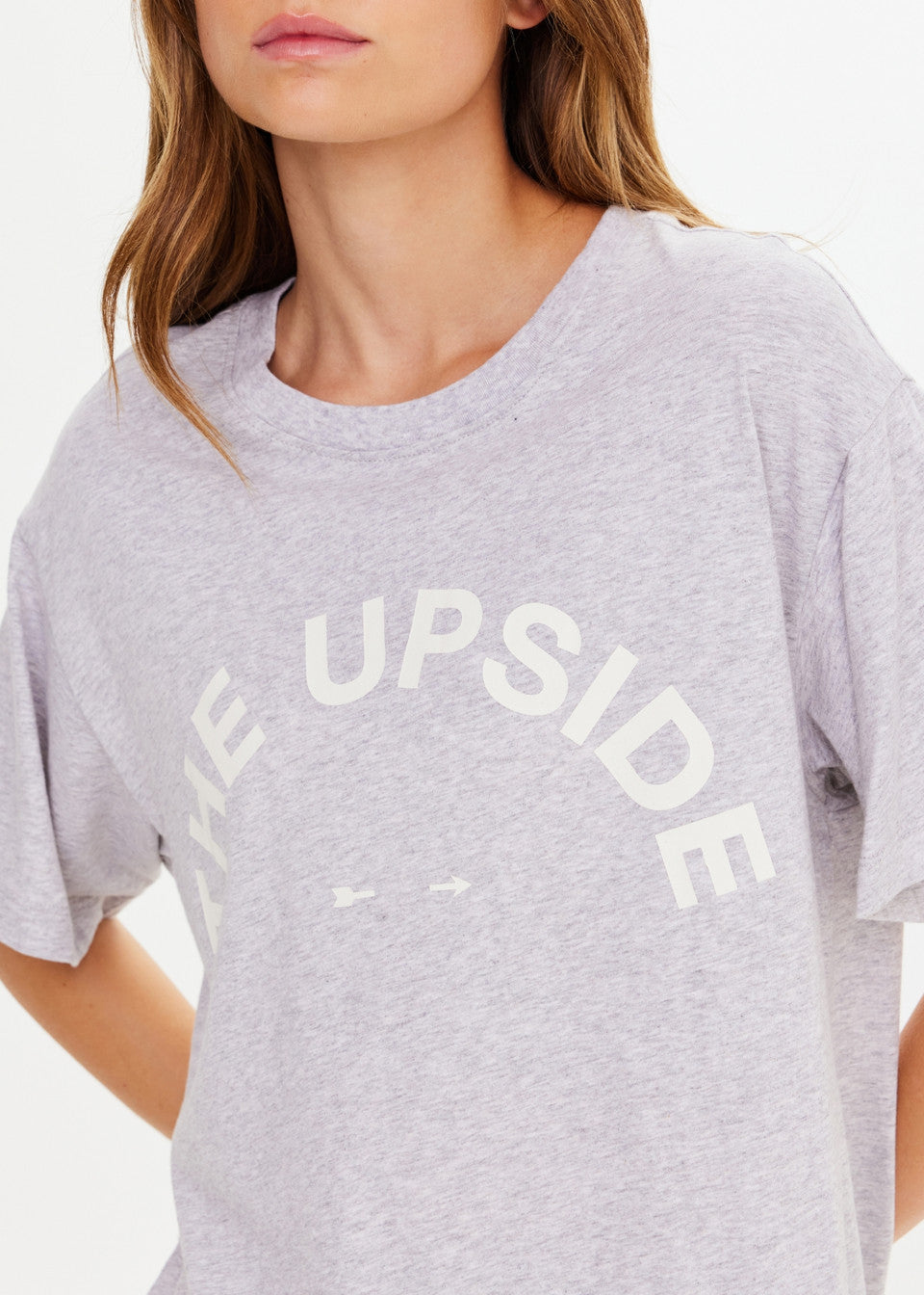 Gray t-shirt with 'The Upside' logo worn by a person