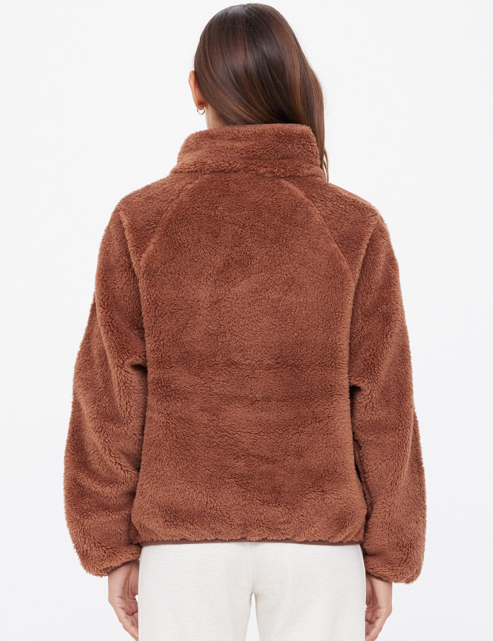 The Upside Harlow Fleece Pullover in Walnut brown — back view on model, relaxed sherpa pullover with quarter zip