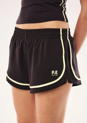 DETAIL PE Nation Stride Running Short in Black Bean & Soft Yellow — lightweight 4-way stretch active short, Wild West Sisters