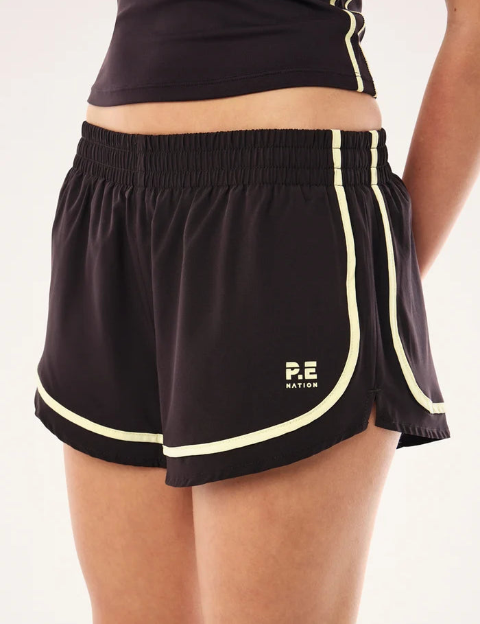 DETAIL PE Nation Stride Running Short in Black Bean & Soft Yellow — lightweight 4-way stretch active short, Wild West Sisters