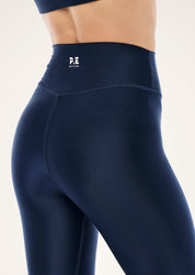 P.E Nation Fairmont legging shine fabric and logo detail close up