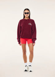 P.E Nation Washed Cabernet sweat styled with activewear for everyday outfit