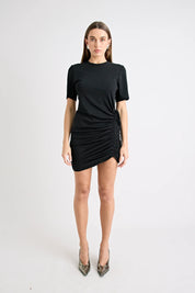 Woman wearing a black dress on a white background