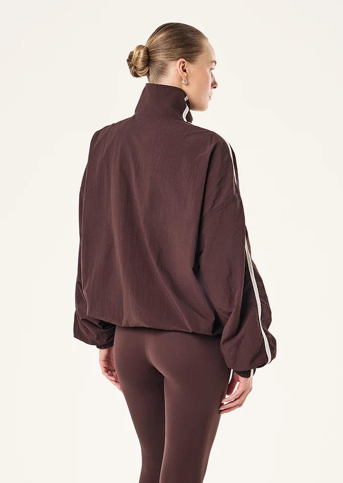 back view P.E Nation Radius Jacket in Dark Plum - oversized funnel neck jacket with side stripe detail