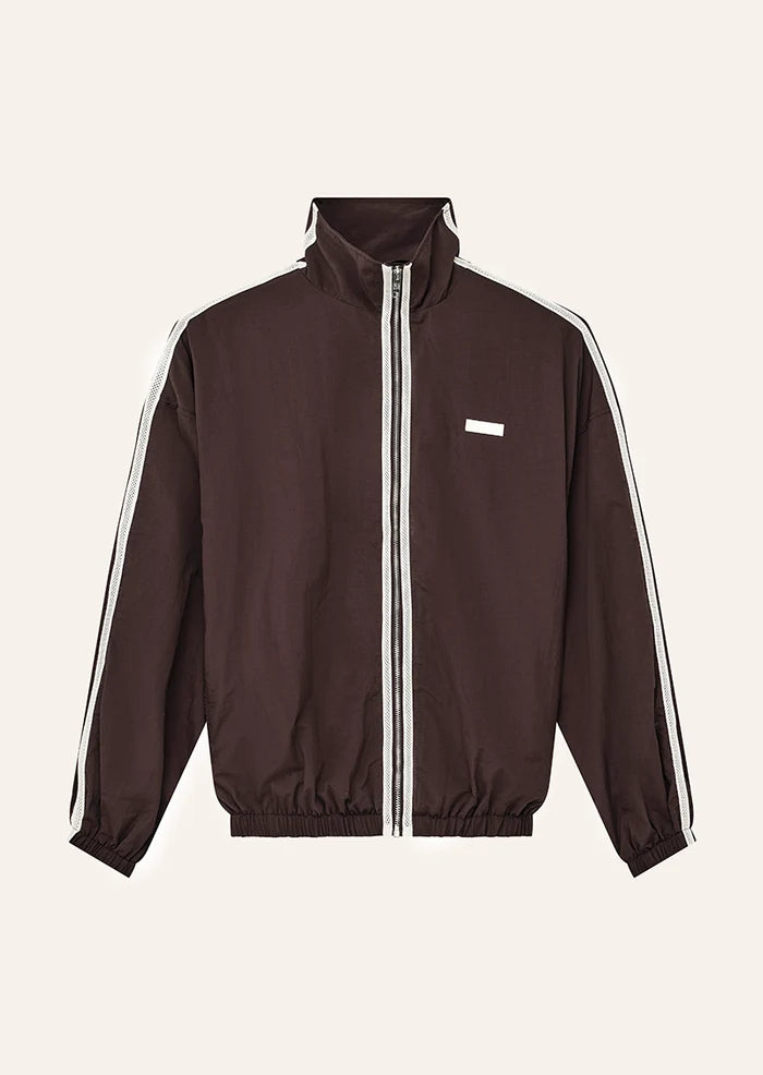flatlay P.E Nation Radius Jacket in Dark Plum - oversized funnel neck jacket with side stripe detail