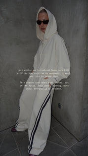 ŚSAINT Barrel Trackpant butter and navy styled with matching Cropped Hoodie