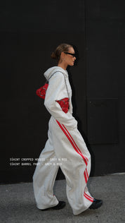 ŚSAINT Cropped Hoodie grey and red styled with matching Barrel Trackpant