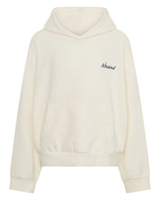 ŚSAINT Kids Logo Hoodie in butter with navy embroidered chest logo