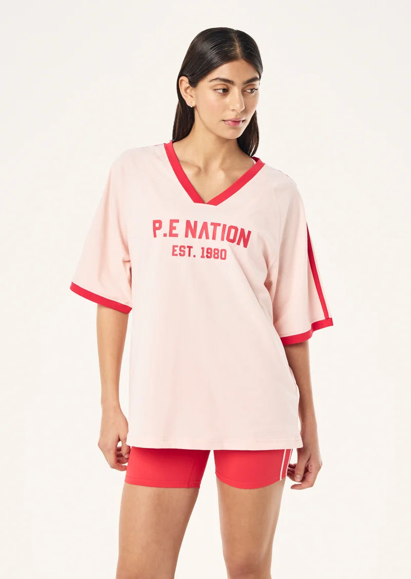 P.E Nation Spinout Baseball Tee in Soft Pink - oversized organic cotton jersey with contrast binding