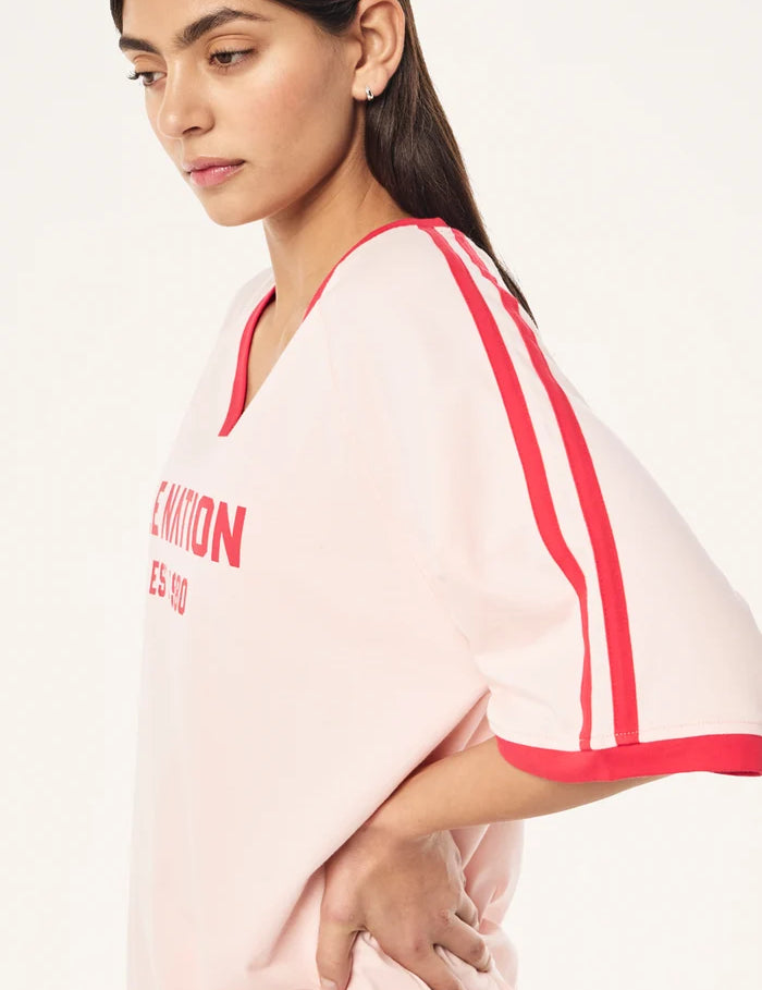 P.E Nation Spinout Baseball Tee in Soft Pink - oversized organic cotton jersey with contrast binding - detail of binding