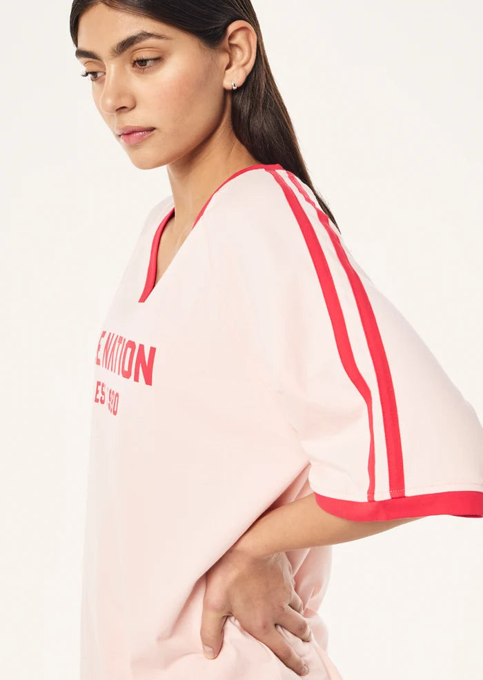 P.E Nation Spinout Baseball Tee in Soft Pink - oversized organic cotton jersey with contrast binding - detail of binding