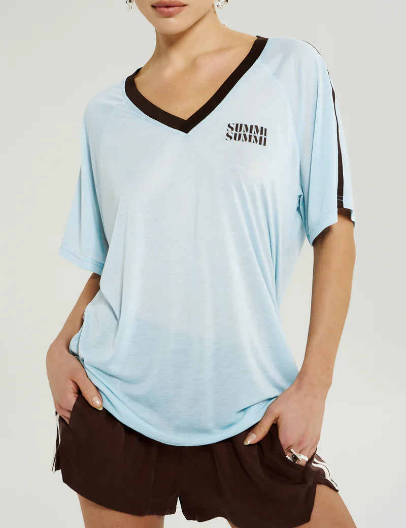 Summi Summi V-Neck Jersey Tee in Icel Blue, lightweight knit tee with contrast chocolate binding and front logo.