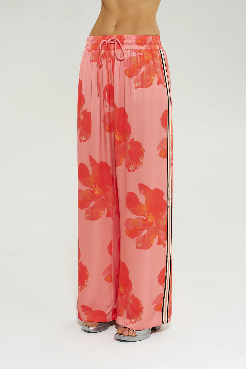 Close-up of Peach Petals print and contrast side stripe on Summi Summi La Vie Pant