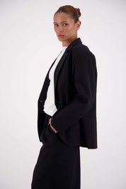 Close-up of single button closure and notch lapel on Jasmine Alexa Sabine Blazer Black