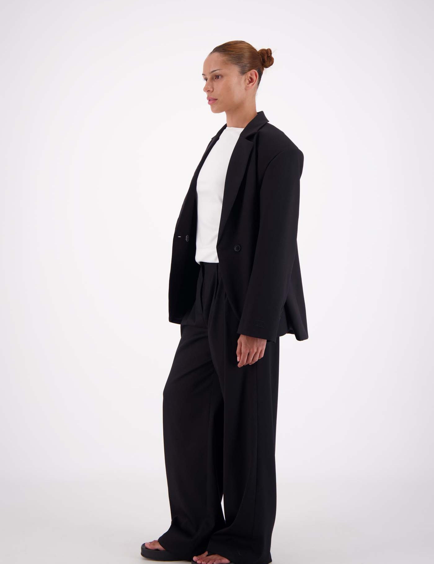 Jasmine Alexa Sabine Blazer Black showing padded shoulders and longline cut side view 