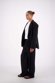 Jasmine Alexa Sabine Blazer Black showing padded shoulders and longline cut side view 