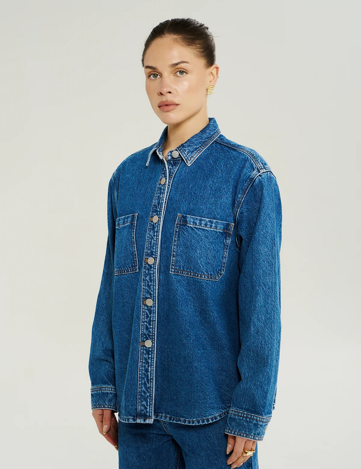 Model wearing Summi Summi Bleu Denim shacket