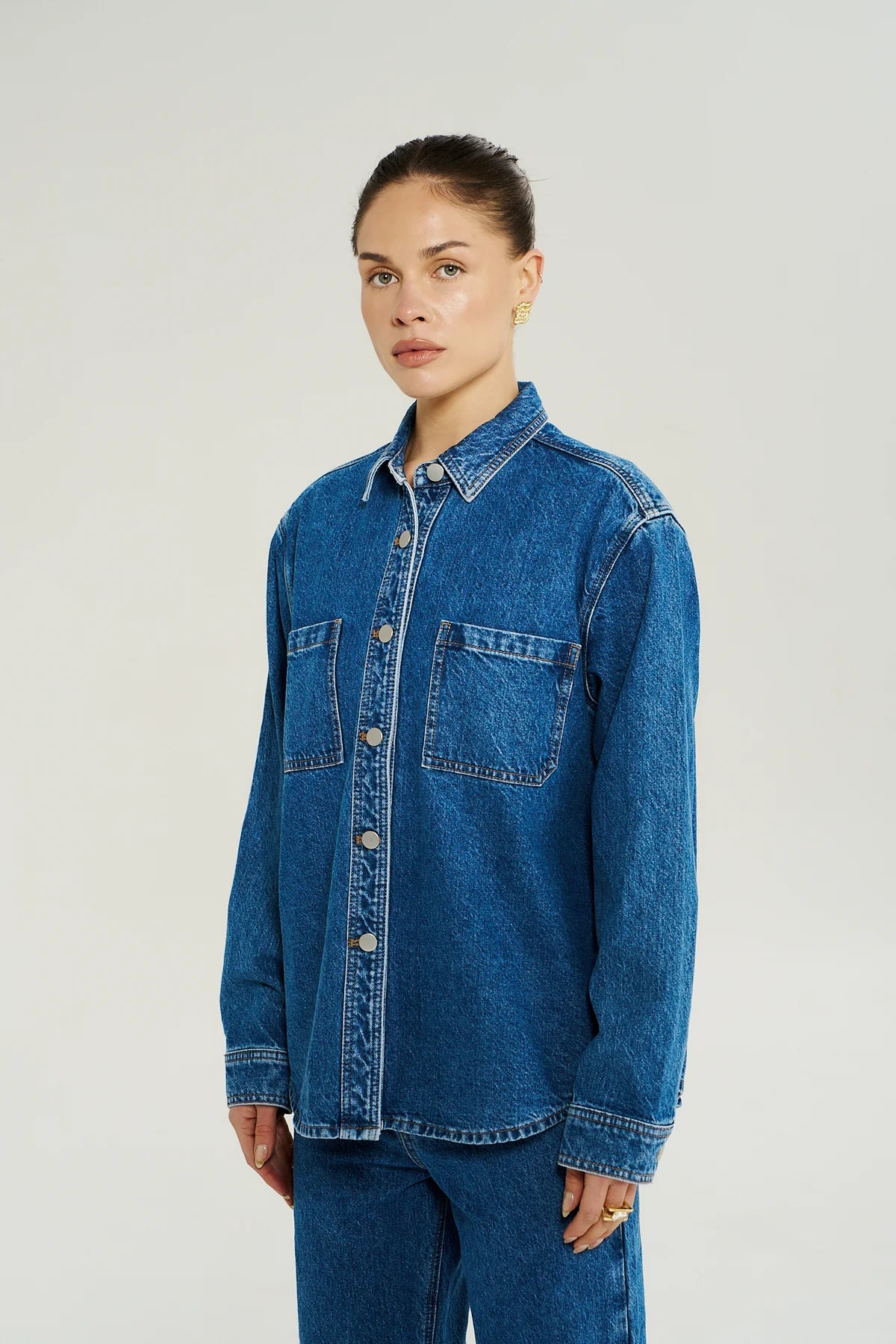 Model wearing Summi Summi Bleu Denim shacket