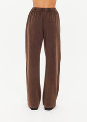 Back view of The Upside Soho Tokio Wide Leg Pant in Cocoa showing embroidered arrow logo detail