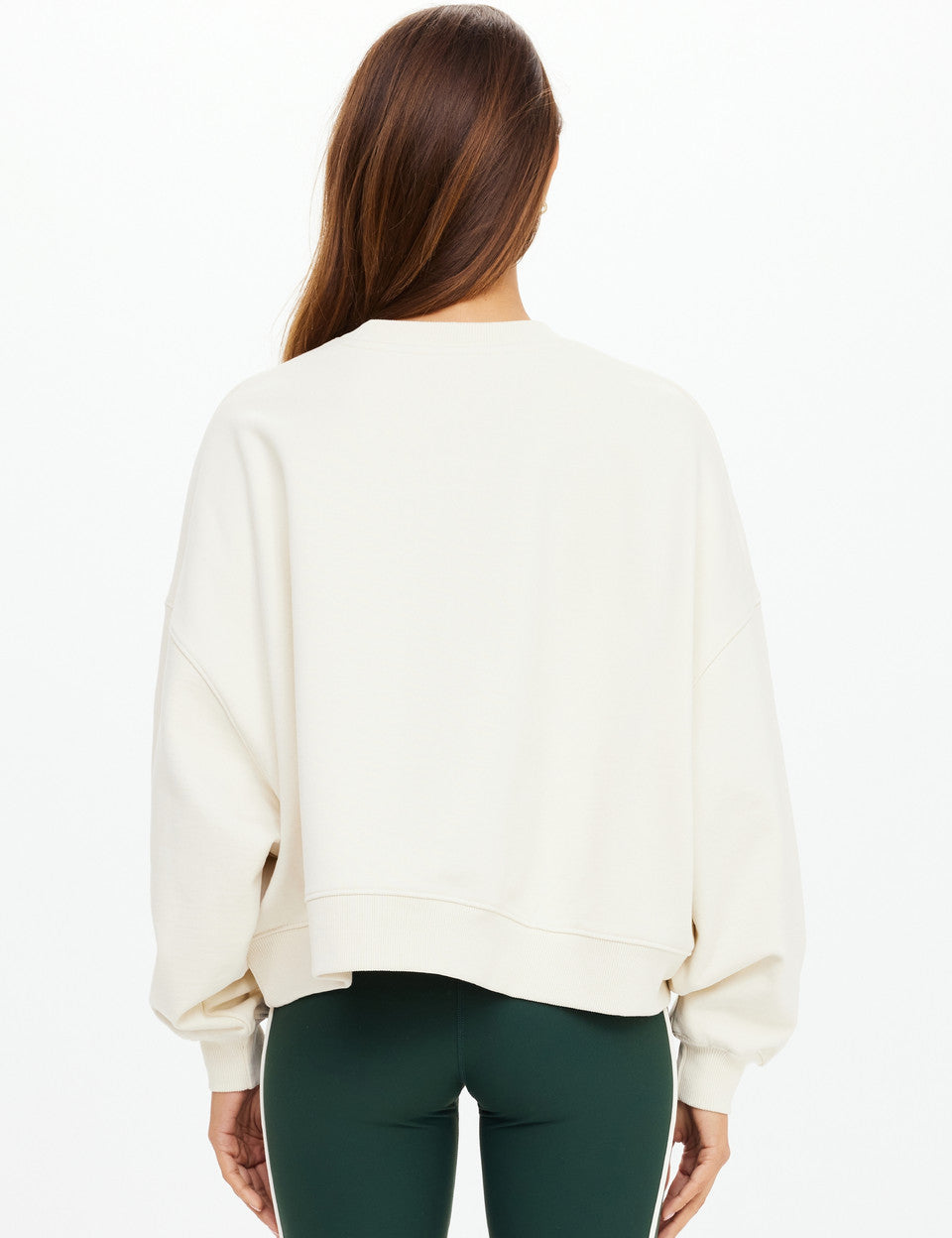 “Back view of The Upside Molokai Paloma Crew in cream with oversized boxy silhouette.”