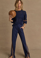 The Upside Toledo Petra Flare Pant in Navy women’s flared pant with stripe detail