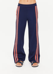 Navy pants with pink stripes on a white background
