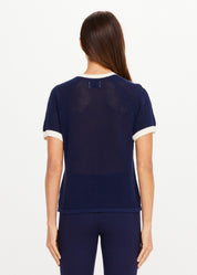 The Upside Fenway Jordan Knit Tee in navy with cream stripe sleeve detail back view