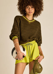 The Upside Castilla Clementine Knit styled with Lucky Run Short lime athleisure outfit