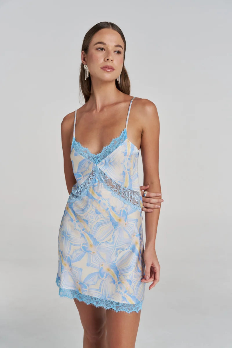 close up Model wearing the Summi Summi Siren Lace Mini Dress in Orchid Prism