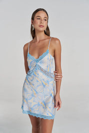 close up Model wearing the Summi Summi Siren Lace Mini Dress in Orchid Prism