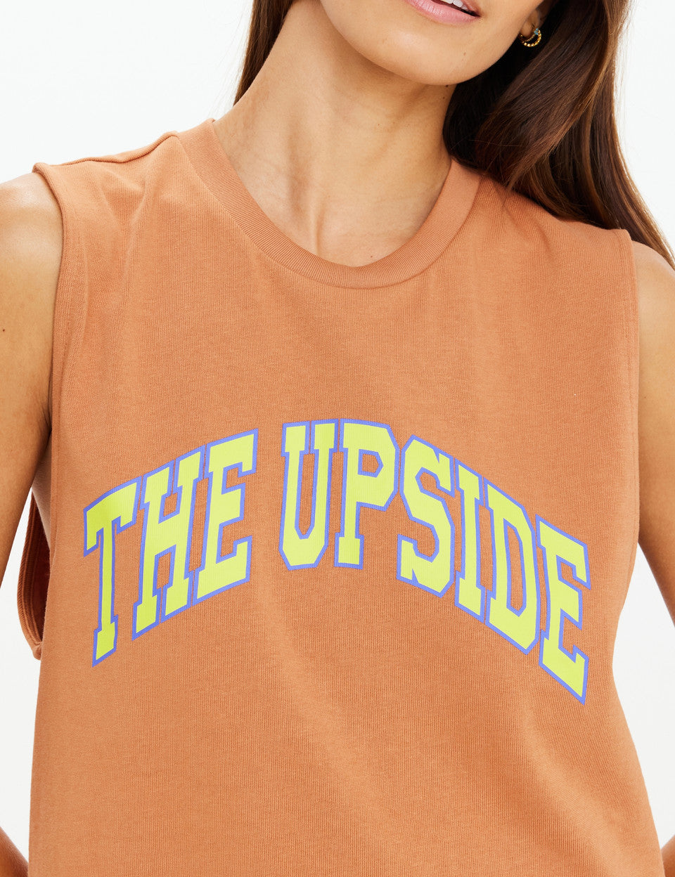 Model wearing The Upside Dawson Tank melon relaxed muscle tank