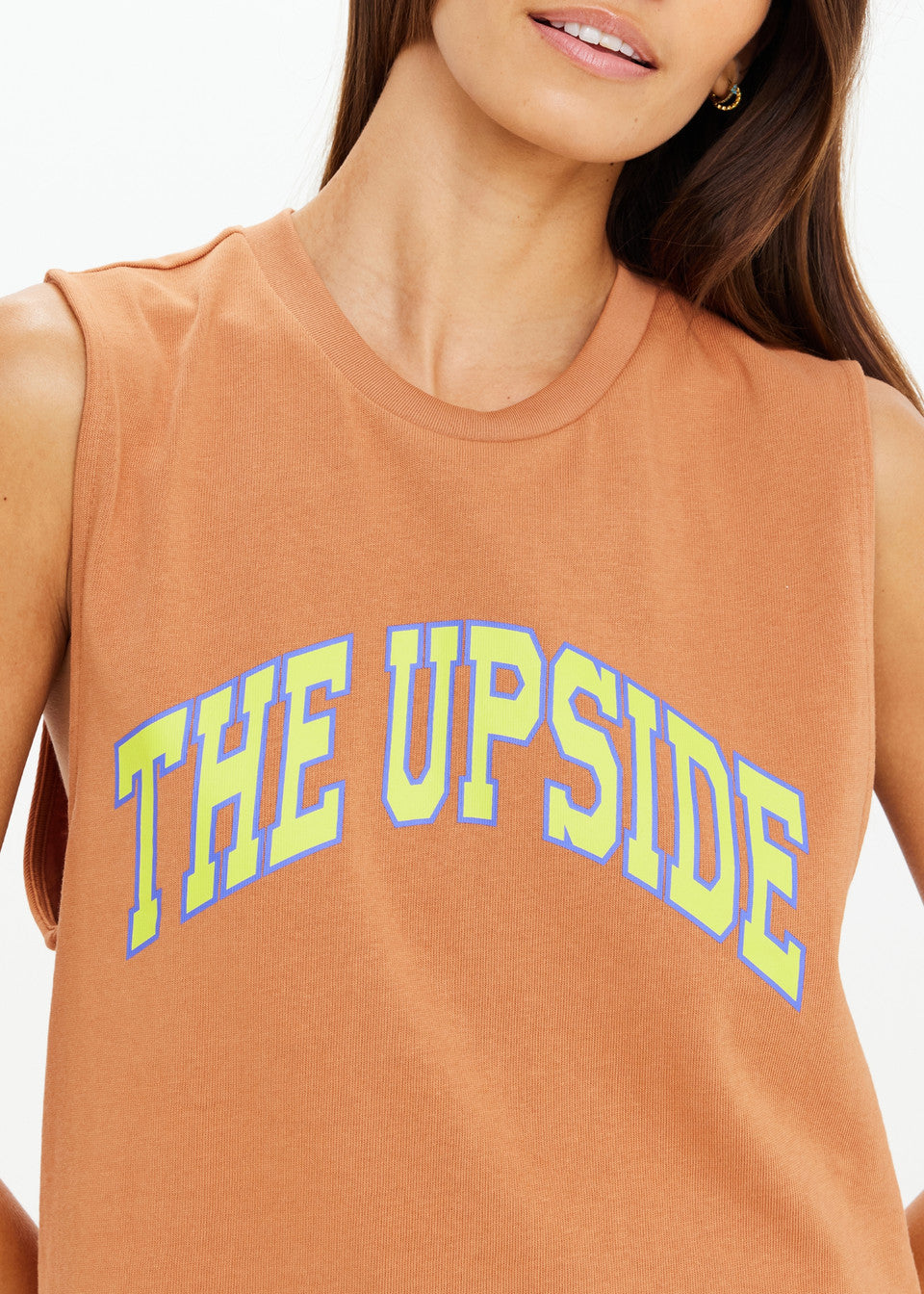 Model wearing The Upside Dawson Tank melon relaxed muscle tank